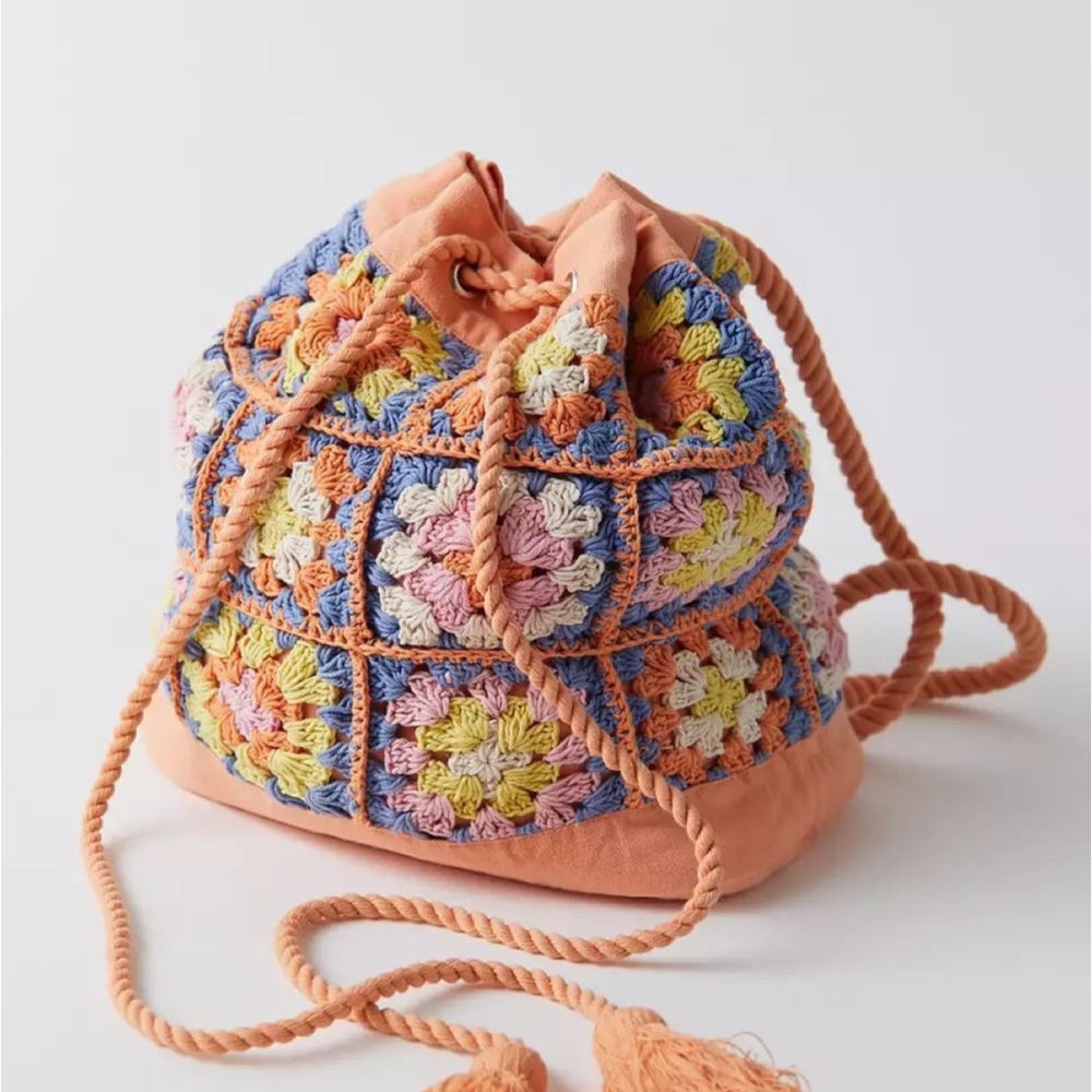 Urban Outfitters Crochet Drawstring Backpack in Peach, Blue, Yellow, Pink